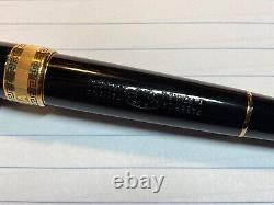 Aurora Optima Medium Nib Black and Gold Trim Fountain Pen