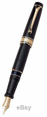 Aurora Optima black with gold trim piston filling fountain pen 14kt Medium MIB