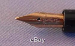 Rexall Black Chased Hard Rubber Thumb Filler-very flexible fine point nib