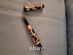 Trio, Inc. Phantas I Silver Snake with Red Jewel Eyes Adorns the Fountain Pen