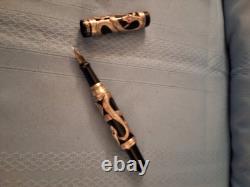 Trio, Inc. Phantas I Silver Snake with Red Jewel Eyes Adorns the Fountain Pen