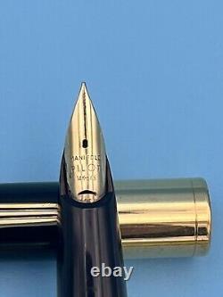 Rare stylo-plume vintage avec plume en or 14K et corps noir/golden trim fabriqué au Japon