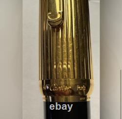 Stylo à plume CARTIER noir et or 18 carats - État neuf