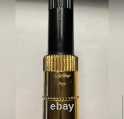 Stylo à plume CARTIER noir et or 18 carats - État neuf