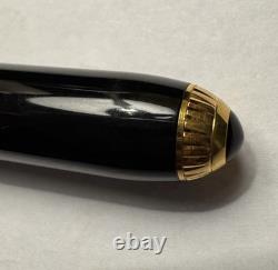Stylo à plume CARTIER noir et or 18 carats - État neuf
