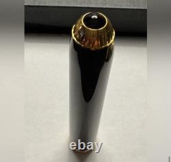 Stylo à plume CARTIER noir et or 18 carats - État neuf
