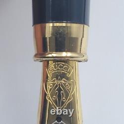 Stylo-plume GUCCI vintage ancien GUCCI noir et or en plastique
