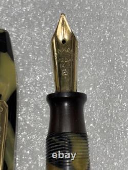 Stylo plume en or 14k avec médaillon en diamant taillé